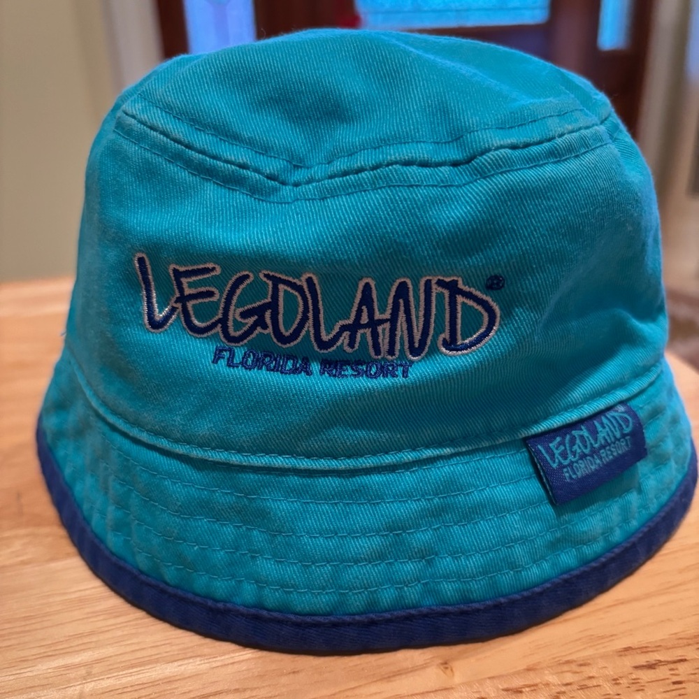 Kids Legoland Florida Resort Blue bucket Hat. Teal and aqua reversible.